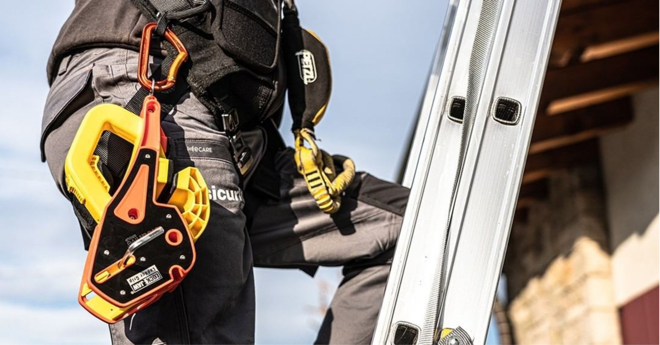 A Lock Jaw Ladder Grip in use with an extension ladder